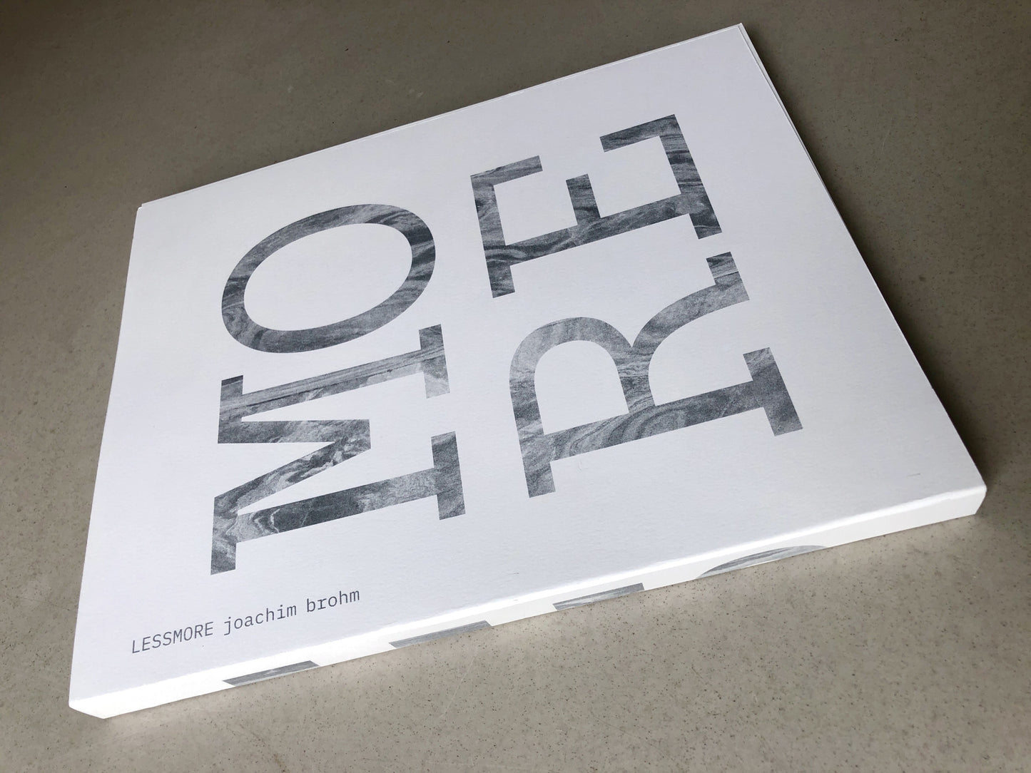 LESSMORE [Signed]